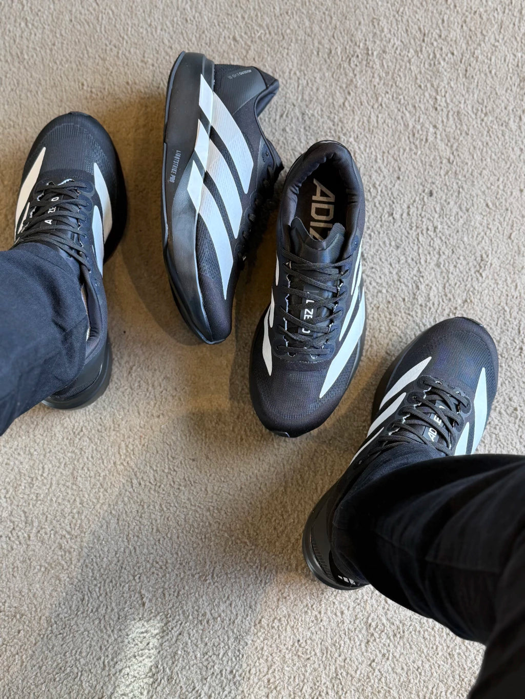 Adizero preto com branco