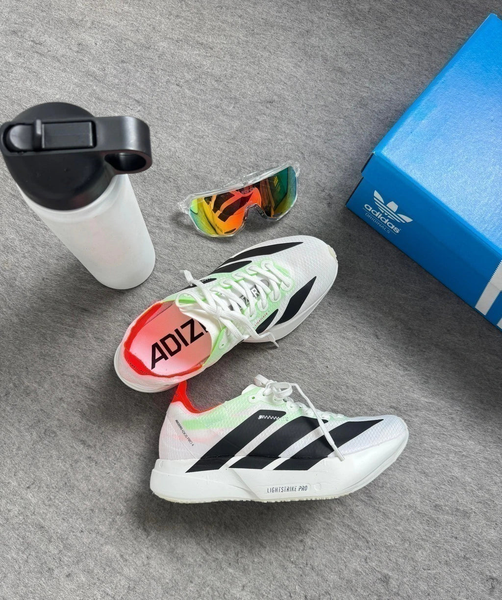Adizero Adio Pro 4 - Branco/Preto