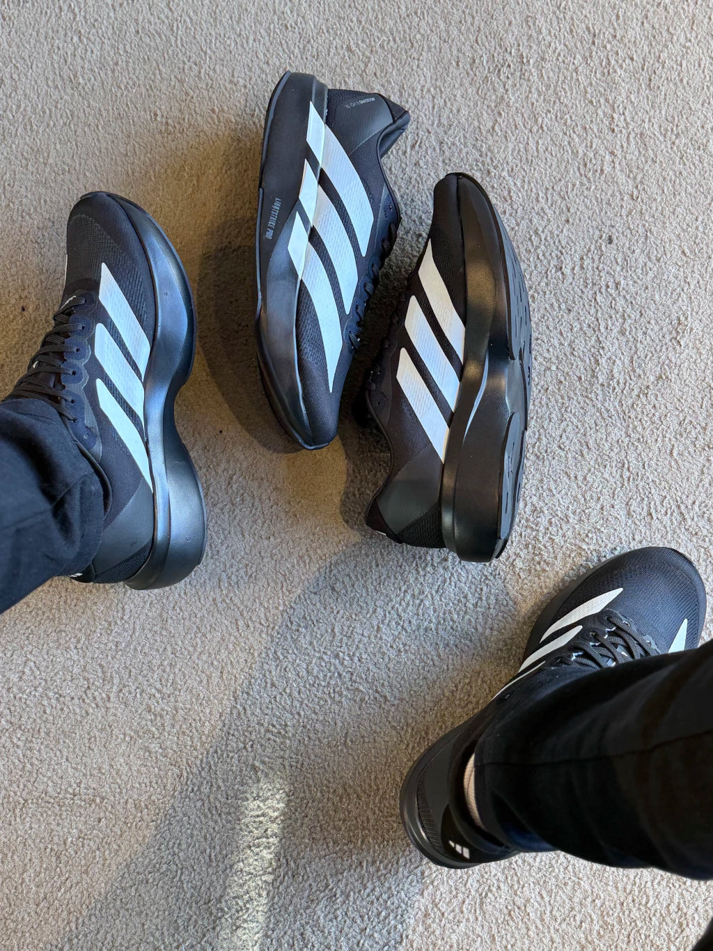 Adizero preto com branco